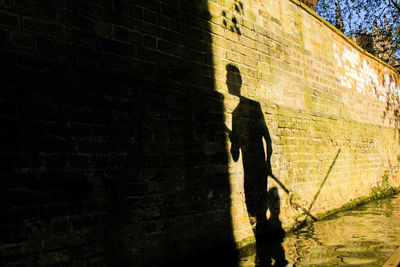 Shadow of man on wall