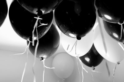 Low angle view of balloons hanging from ceiling