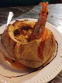 Close-up of bread in plate on table