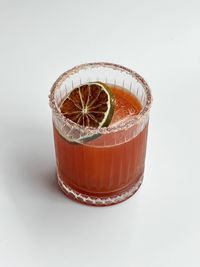 Close-up of drink on white background