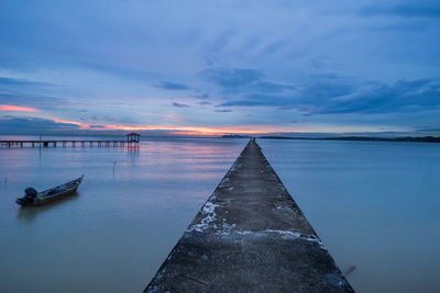 Scenic view of calm sea at dusk