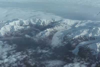 Scenic view of frozen sea against sky