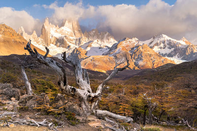 Panoramic view of snowcapped mountains against sky