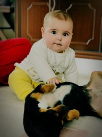 Portrait of cute baby girl at home