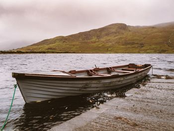 Fishing boat in the irish lake moody weather