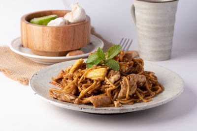 Close-up of noodles in bowl on table