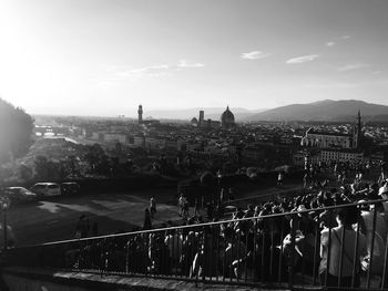 High angle view of people in city against sky