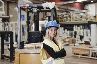 Portrait of woman standing in gym