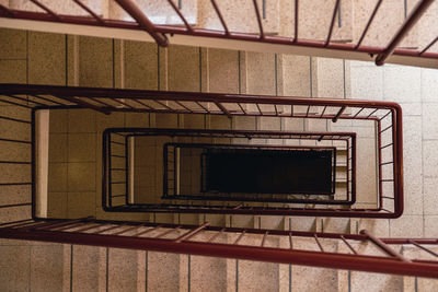 Directly below shot of spiral staircase of building