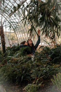 View of  plants , mom and son 