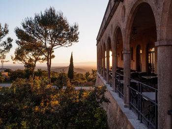 View of historical building against sky during sunset