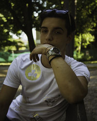 Portrait of young man standing outdoors