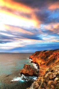 Scenic view of sea against sky at sunset