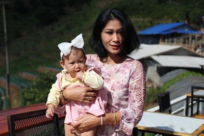 Portrait of mother and daughter