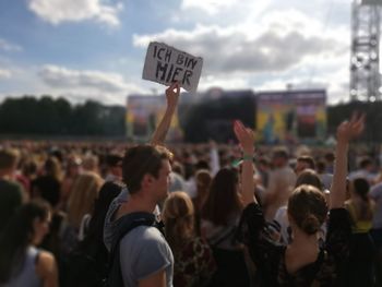 Group of people against the sky