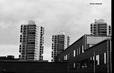 Low angle view of skyscrapers against sky