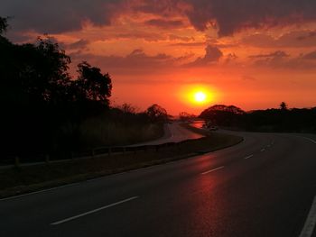 Road against sky during sunset