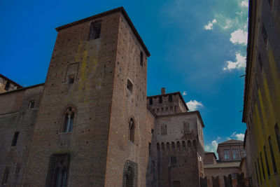 Low angle view of old building against sky