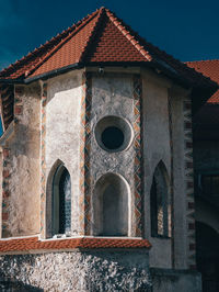 Low angle view of old building against sky