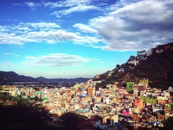 High angle shot of townscape against sky