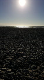 Scenic view of sea against clear sky during sunset