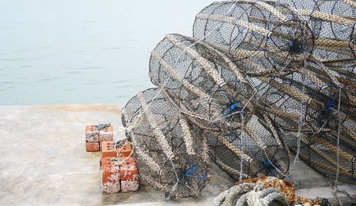 High angle view of fishing net on beach