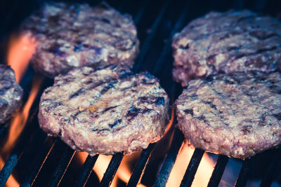 Close-up of meat on barbecue grill