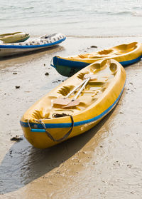 High angle view of boats moored on shore