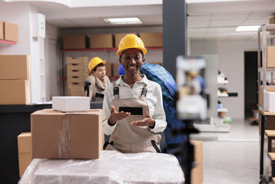 Side view of man working in office