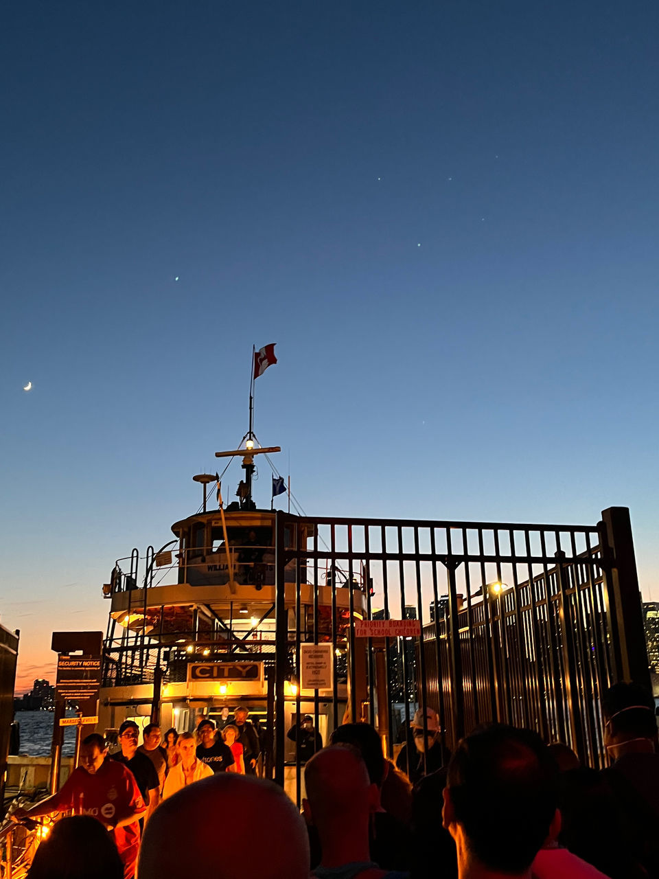 evening, sky, night, group of people, architecture, crowd, dusk, nature, arts culture and entertainment, large group of people, person, men, clear sky, built structure, clothing, city, outdoors, leisure activity, enjoyment, adult, moon, silhouette, illuminated