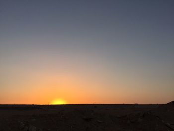 Scenic view of landscape at sunset