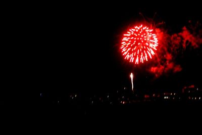 Firework display at night