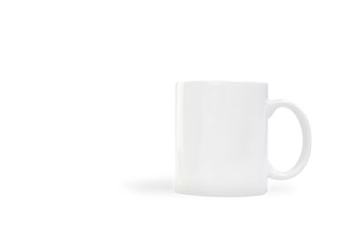 Close-up of coffee cup over white background