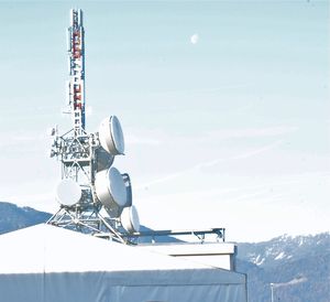 Communications tower against sky