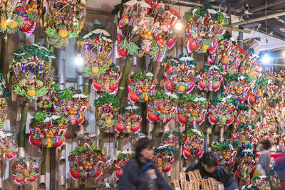 Various flowers for sale at market stall