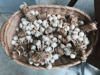 High angle view of garlic in basket