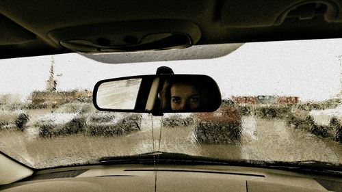 Close-up of wet car window