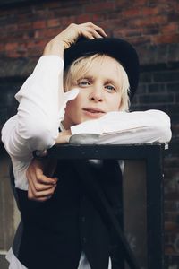 Portrait of cute boy standing outdoors