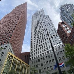 Low angle view of modern buildings against sky