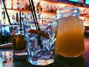 Close-up of beer in glass jar on table