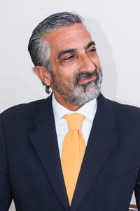 Mid adult man over white background