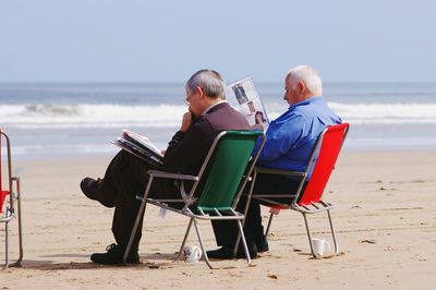 Woman sitting on beach