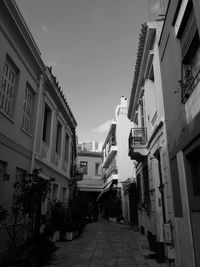 Narrow street amidst buildings in town