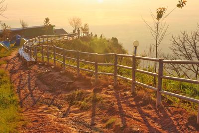 Scenic view of landscape against sky during sunset