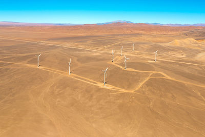 Aerial view of a wind farm in the atacama desert outside the city of calama, chile