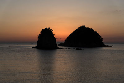 Scenic view of sea against sky during sunset