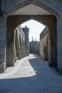 Buildings seen through arch bridge