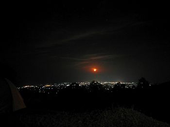 Panoramic view of moon against sky at night