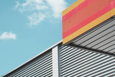 Low angle view of roof top against sky