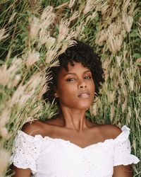 Young black woman relaxing in the grass